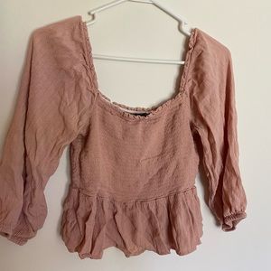 American Eagle brand, off the shoulder, long sleeved blouse.